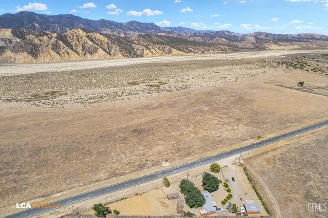 view of a terrace with wooden floor and city view