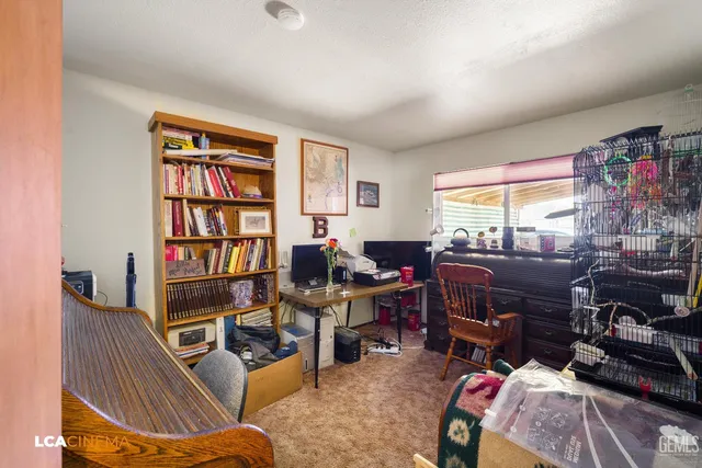 a kitchen with stainless steel appliances granite countertop a refrigerator sink and cabinets