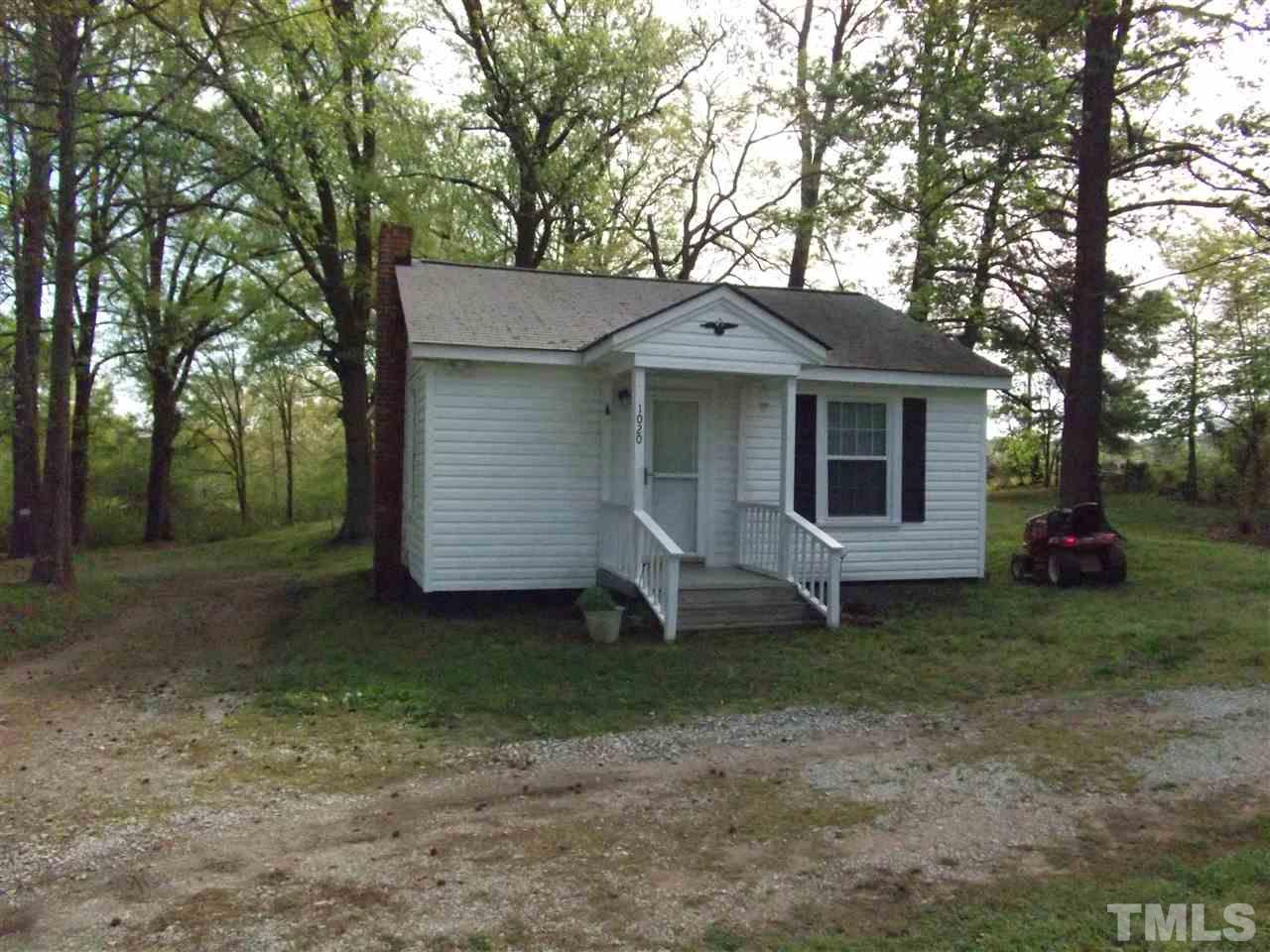 1024 Stallings Road Durham, NC 27703 - Photo 1 of 18 a view of a house with a yard