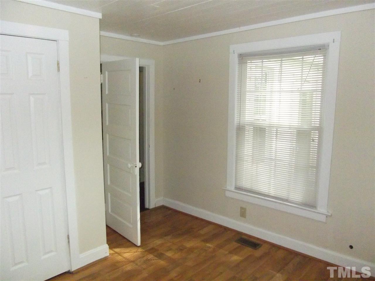 1024 Stallings Road Durham, NC 27703 - Photo 13 of 18 an empty room with window
