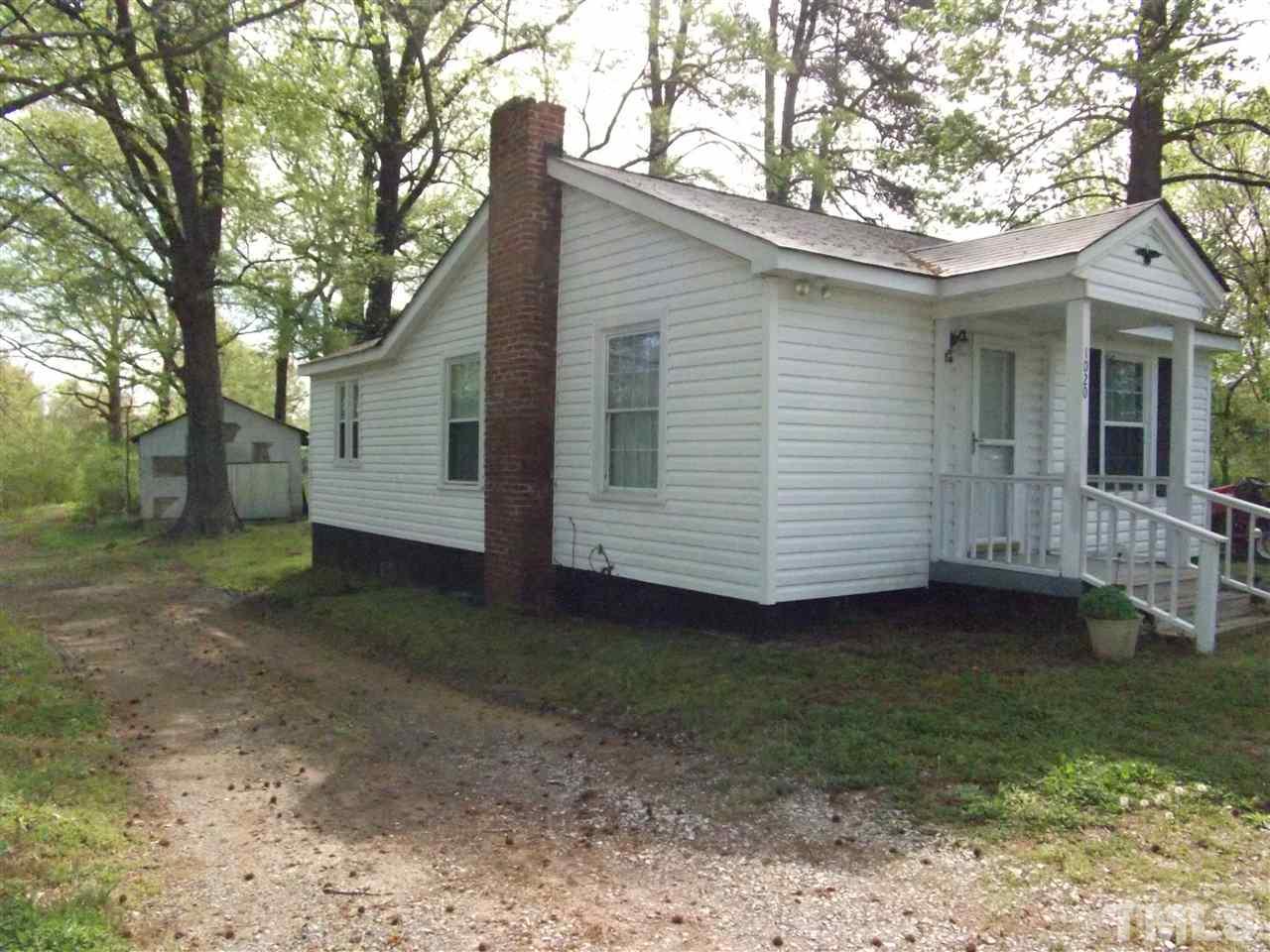 1024 Stallings Road Durham, NC 27703 - Photo 2 of 18 a view of a house with a yard