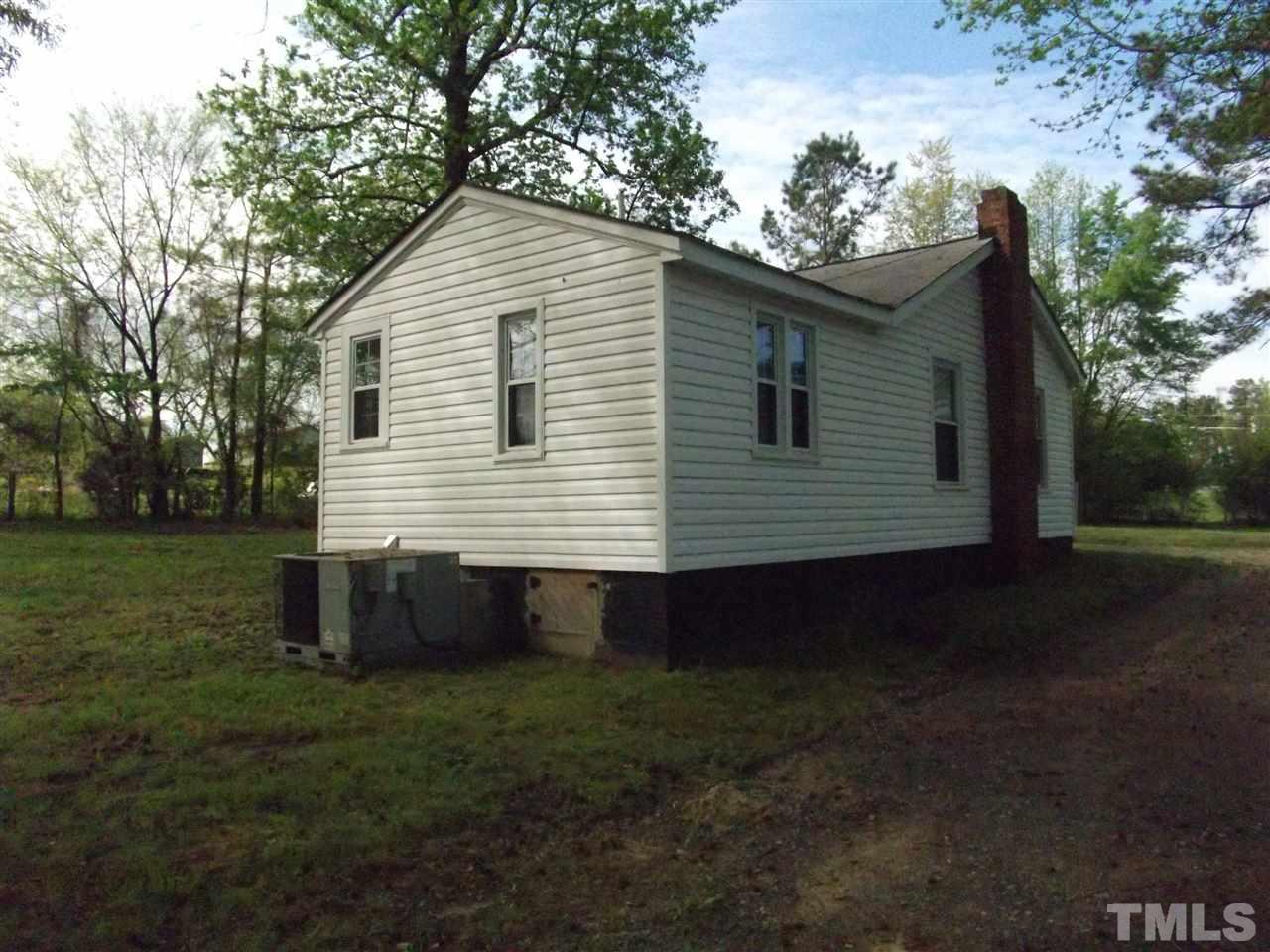 1024 Stallings Road Durham, NC 27703 - Photo 3 of 18 a bathroom with a sink and a yard