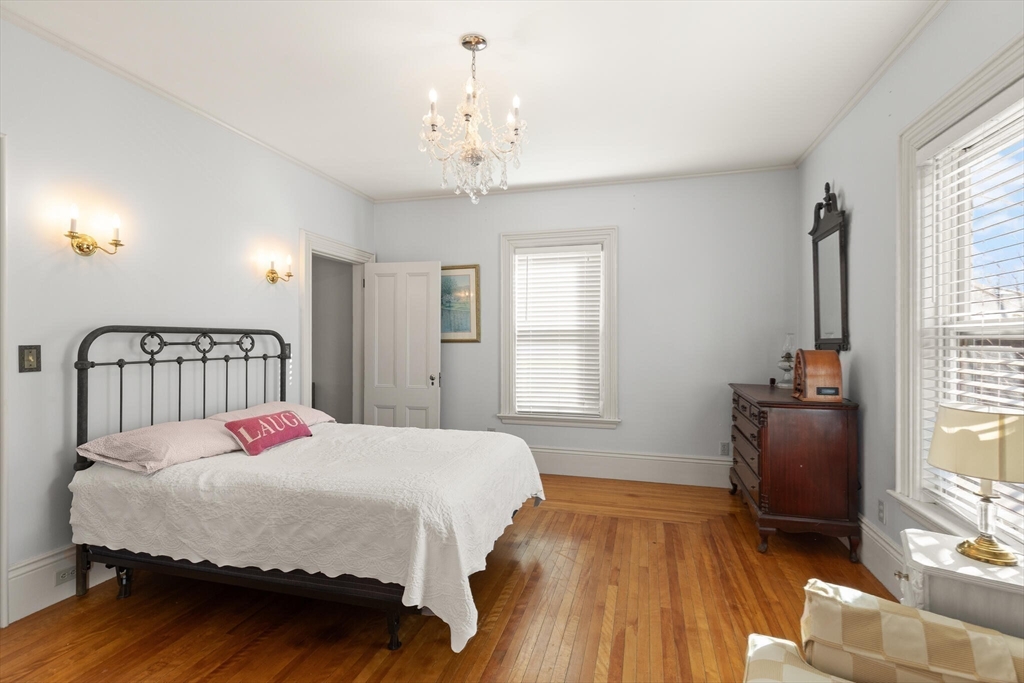 16 Williams Street Salem, MA 01970 - Photo 18 of 29 a bedroom with a bed and a window