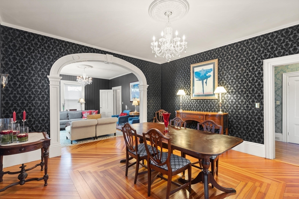 16 Williams Street Salem, MA 01970 - Photo 6 of 29 a view of a dining room with furniture and chandelier
