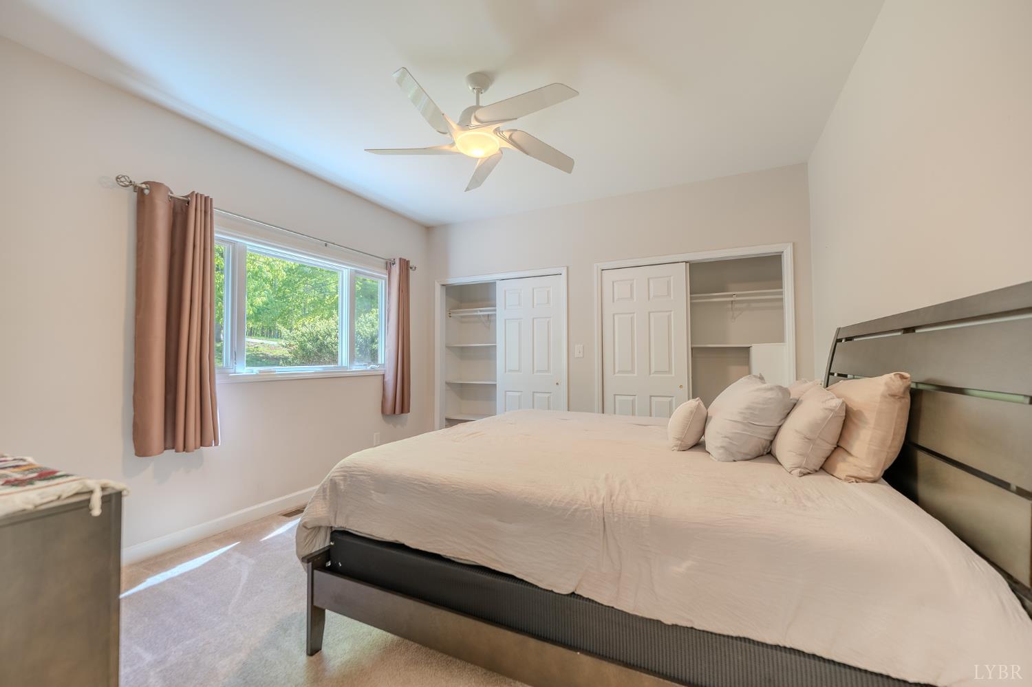 1269 Runaway Bay Road Lynch Station, VA 24571 - Photo 11 of 82 a bedroom with a large bed and a window