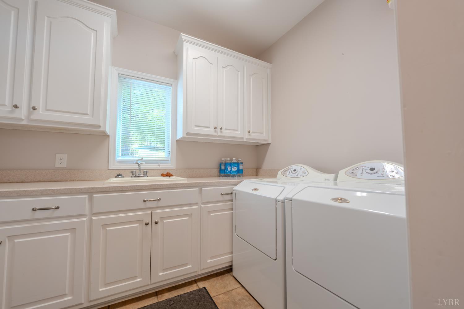 1269 Runaway Bay Road Lynch Station, VA 24571 - Photo 19 of 82 a utility room with dryer and washer
