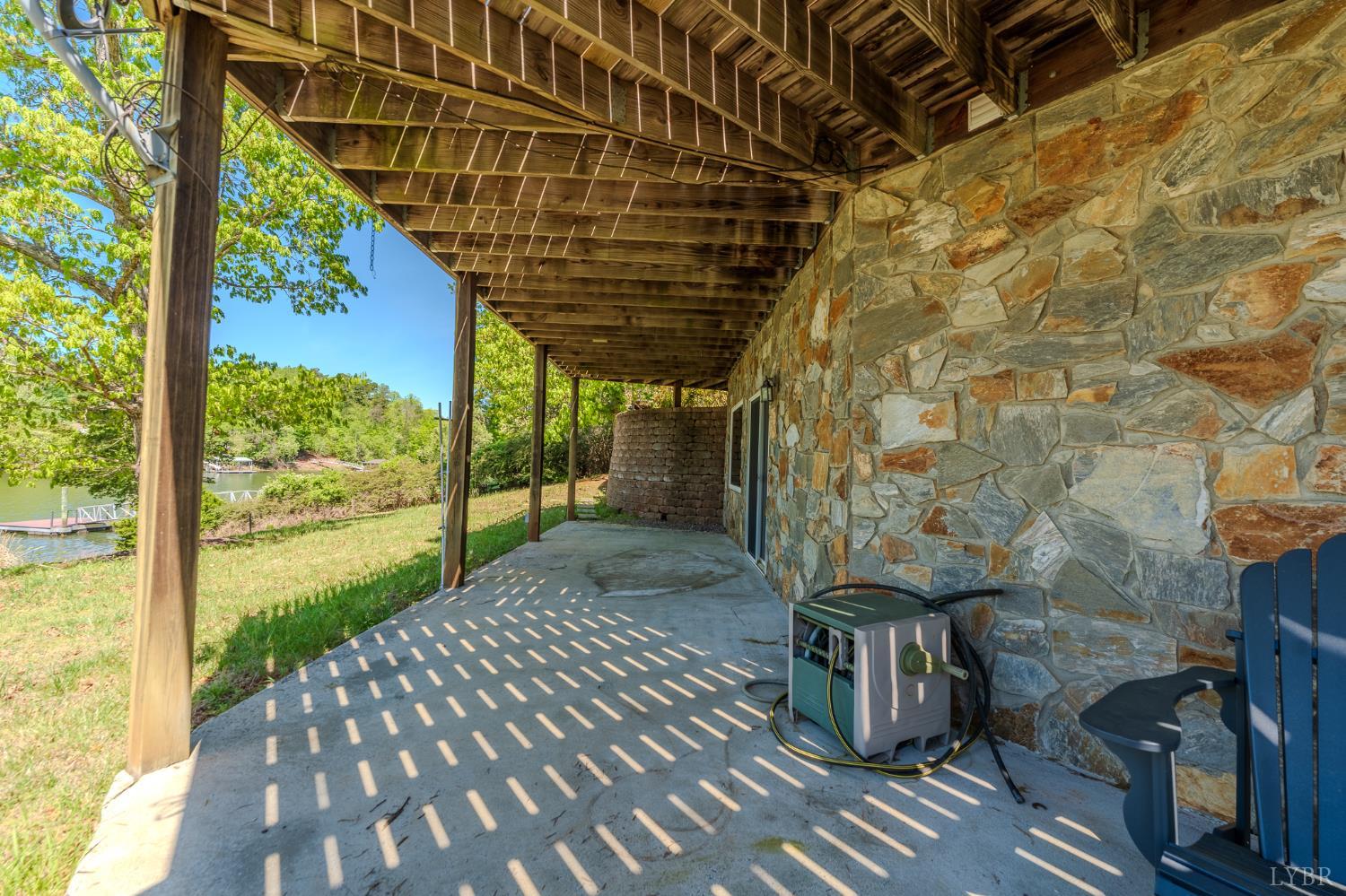 1269 Runaway Bay Road Lynch Station, VA 24571 - Photo 47 of 82 a view of a porch with wooden floor