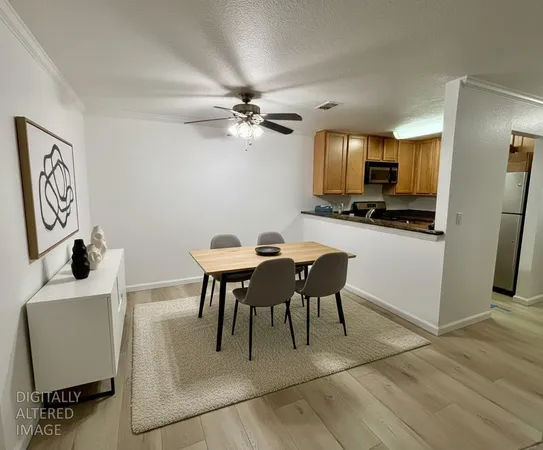 a view of a dining room with furniture