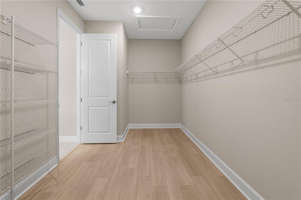 2181 Longliner Loop Wesley Chapel, FL 33543 - Photo 22 of 44 a view of small space with racks on the wall