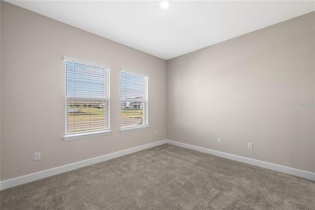 2181 Longliner Loop Wesley Chapel, FL 33543 - Photo 27 of 44 an empty room with a window