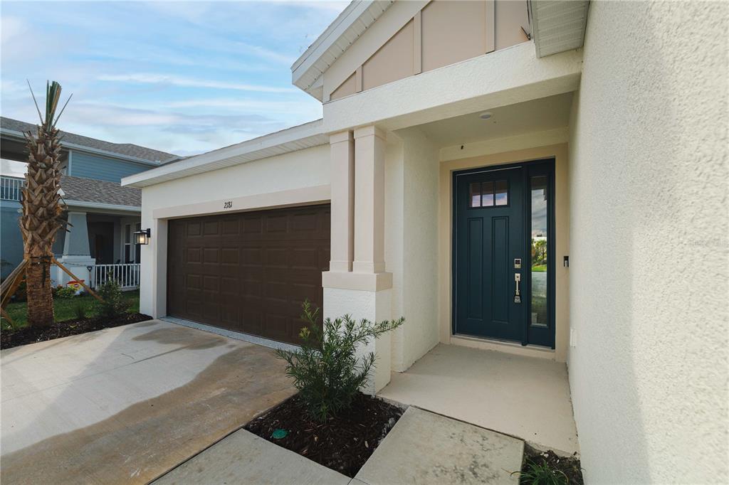 2181 Longliner Loop Wesley Chapel, FL 33543 - Photo 3 of 44 a front view of a house