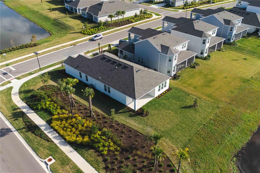 2181 Longliner Loop Wesley Chapel, FL 33543 - Photo 35 of 44 an aerial view of residential houses with outdoor space