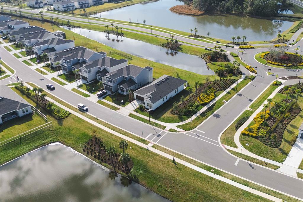 2181 Longliner Loop Wesley Chapel, FL 33543 - Photo 36 of 44 an aerial view of a house with a ocean view