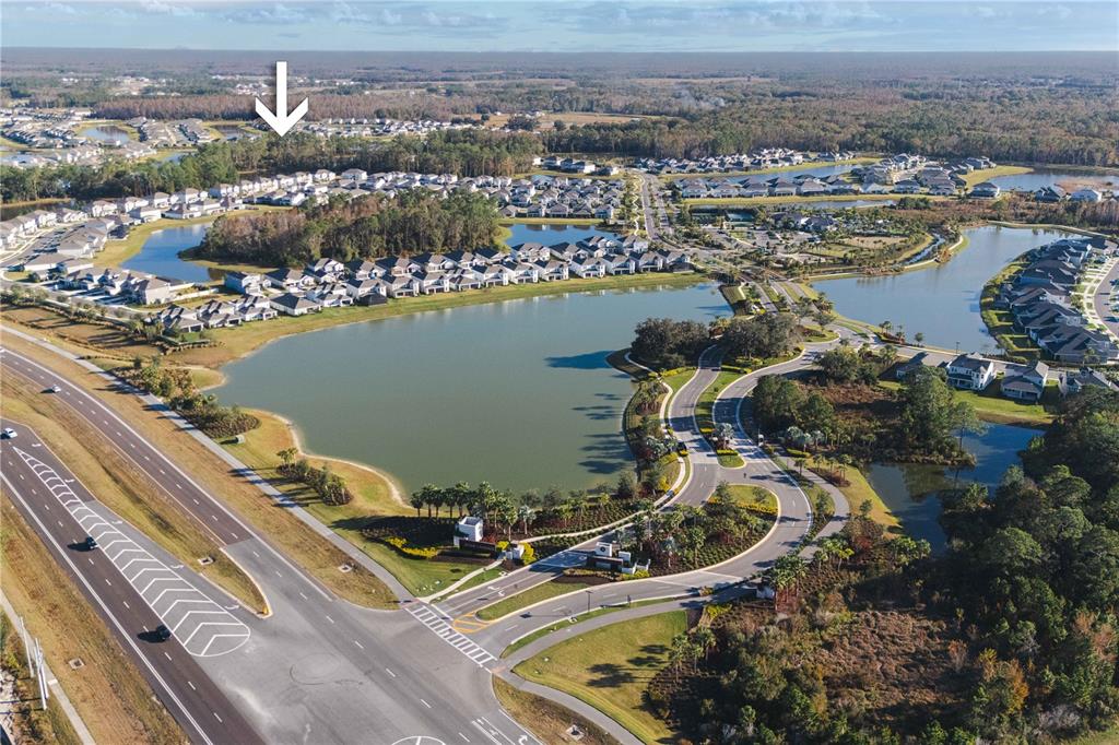 2181 Longliner Loop Wesley Chapel, FL 33543 - Photo 39 of 44 an aerial view of a residential building with outdoor space