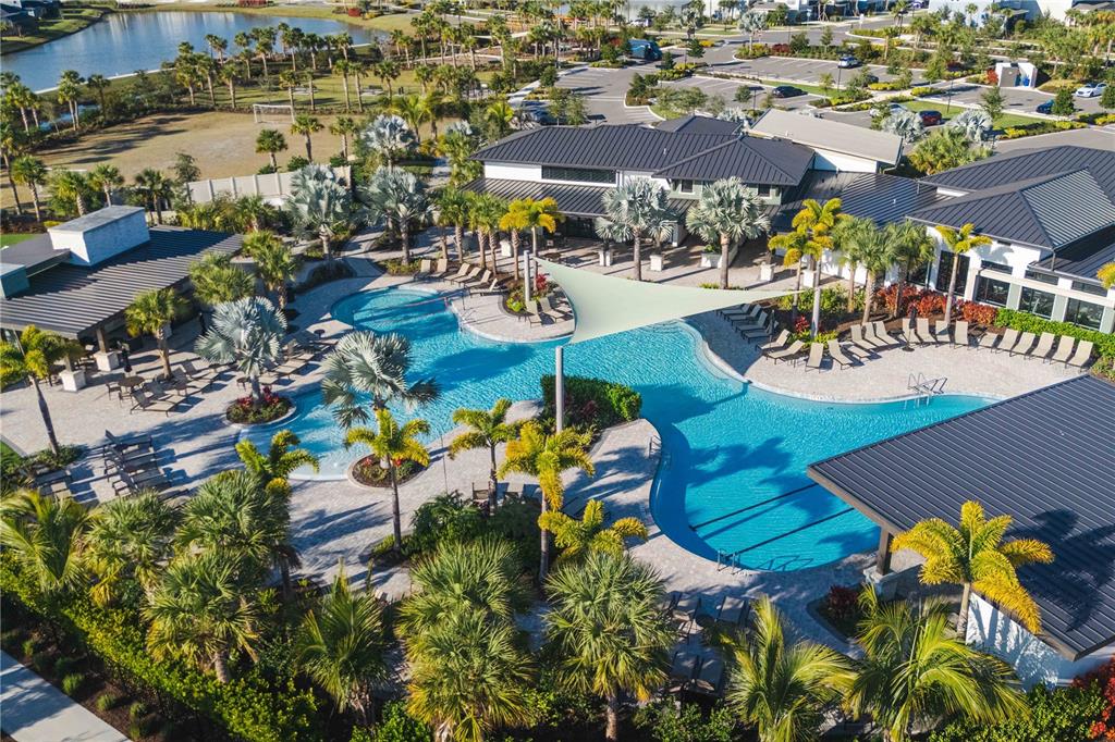 2181 Longliner Loop Wesley Chapel, FL 33543 - Photo 41 of 44 an aerial view of residential houses with outdoor space and swimming pool