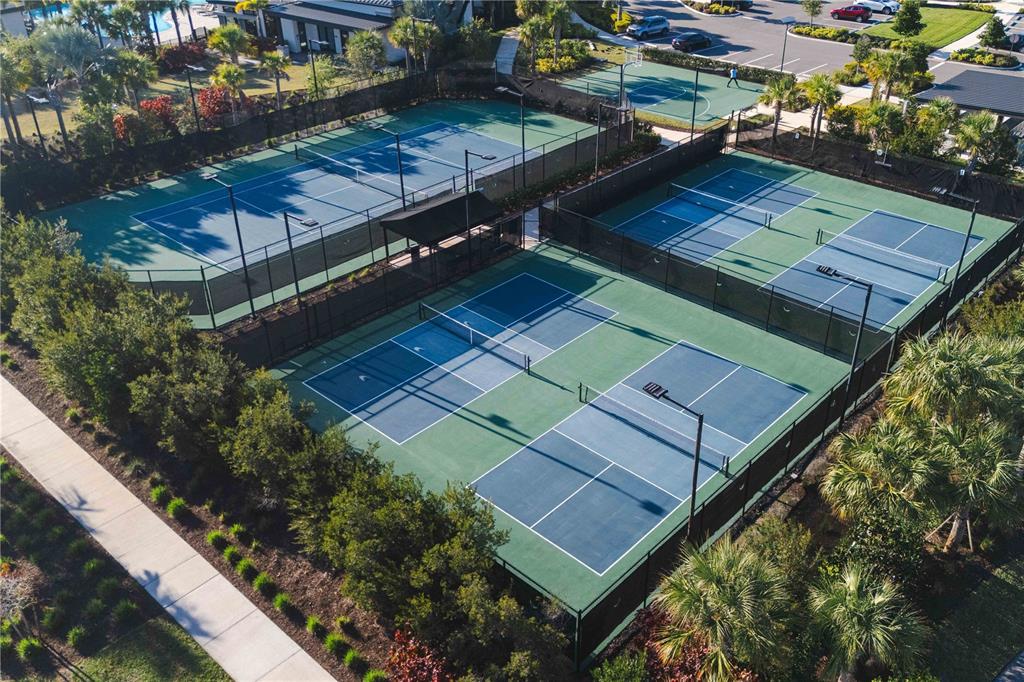 2181 Longliner Loop Wesley Chapel, FL 33543 - Photo 43 of 44 a view of a backyard with sitting area