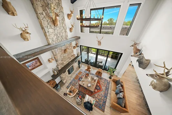 kids bedroom with wooden floor and windows