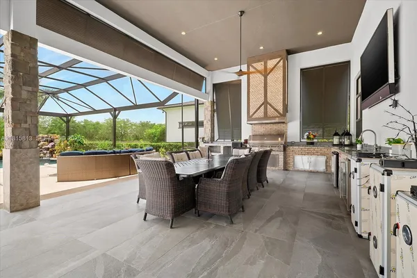 a living room with lots of furniture and a flat screen tv