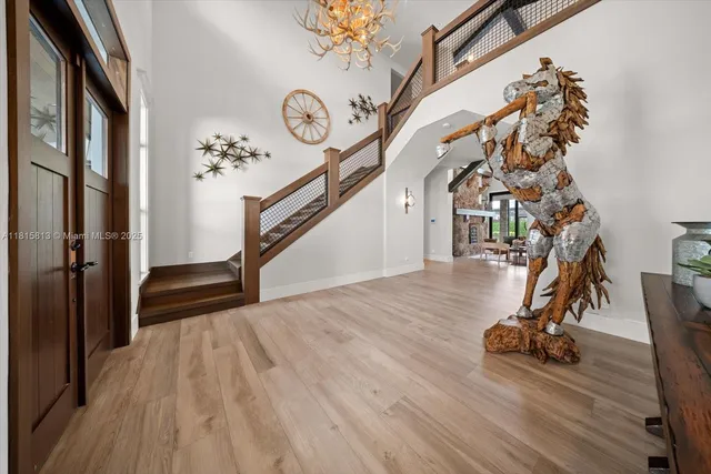 a view of entryway with wooden floor