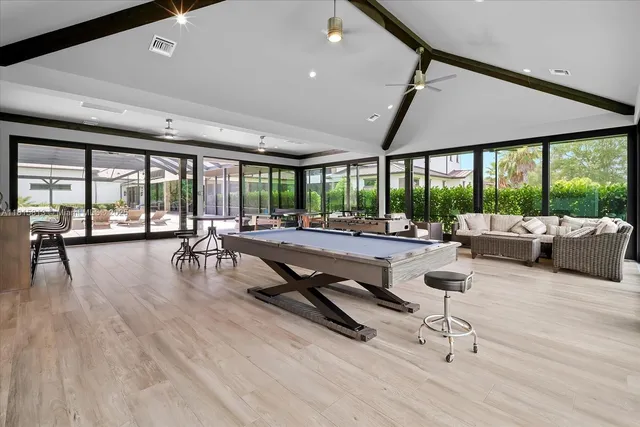 a workspace with furniture and mirror