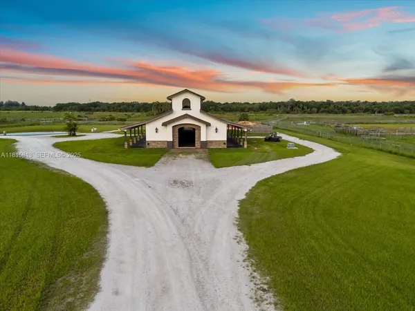 a view of a house with a big yard
