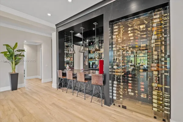 a very nice looking room with a large window and dining space