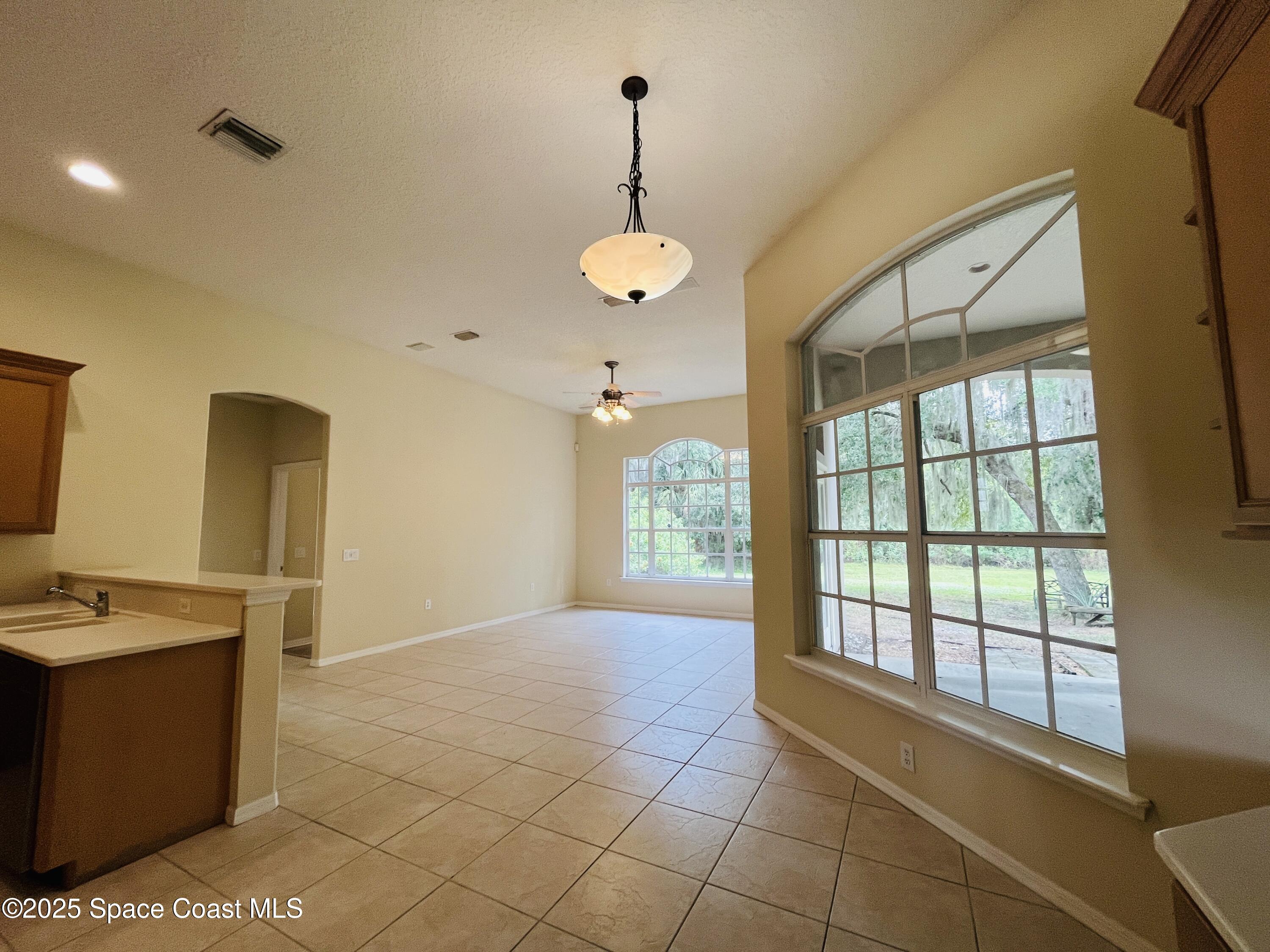 5810 Eagle Way Merritt Island, FL 32953 - Photo 10 of 19 20251217_161724639_iOS