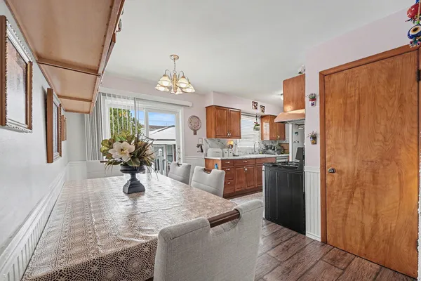 a view of a kitchen and dining room