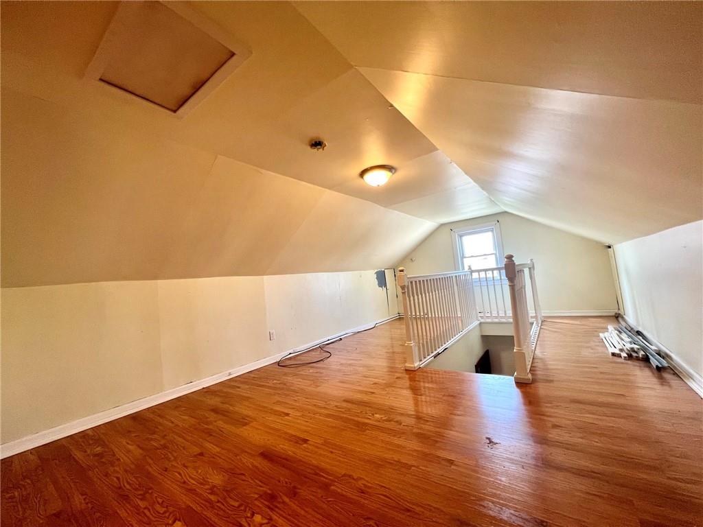 389 Mt Morris Road Mount Morris, PA 15349 - Photo 16 of 25 a view of empty room with wooden floor