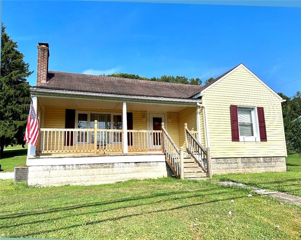 389 Mt Morris Road Mount Morris, PA 15349 - Photo 19 of 25 a view of a house with a swimming pool