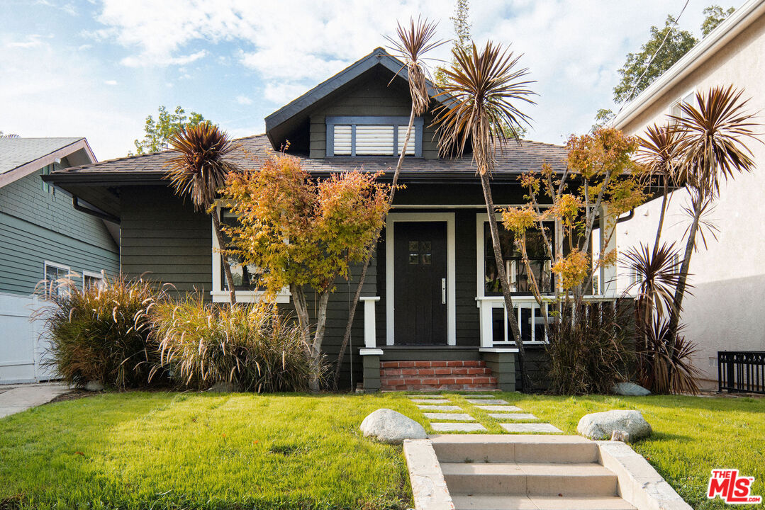 1205 Sanborn Avenue Los Angeles, CA 90029 - Photo 1 of 48 a view of a house with swimming pool and porch