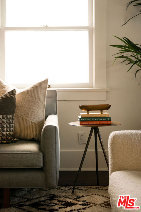 1205 Sanborn Avenue Los Angeles, CA 90029 - Photo 11 of 48 a living room with a couch and a table