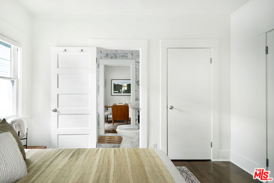1205 Sanborn Avenue Los Angeles, CA 90029 - Photo 16 of 48 a bedroom with a bed and a table
