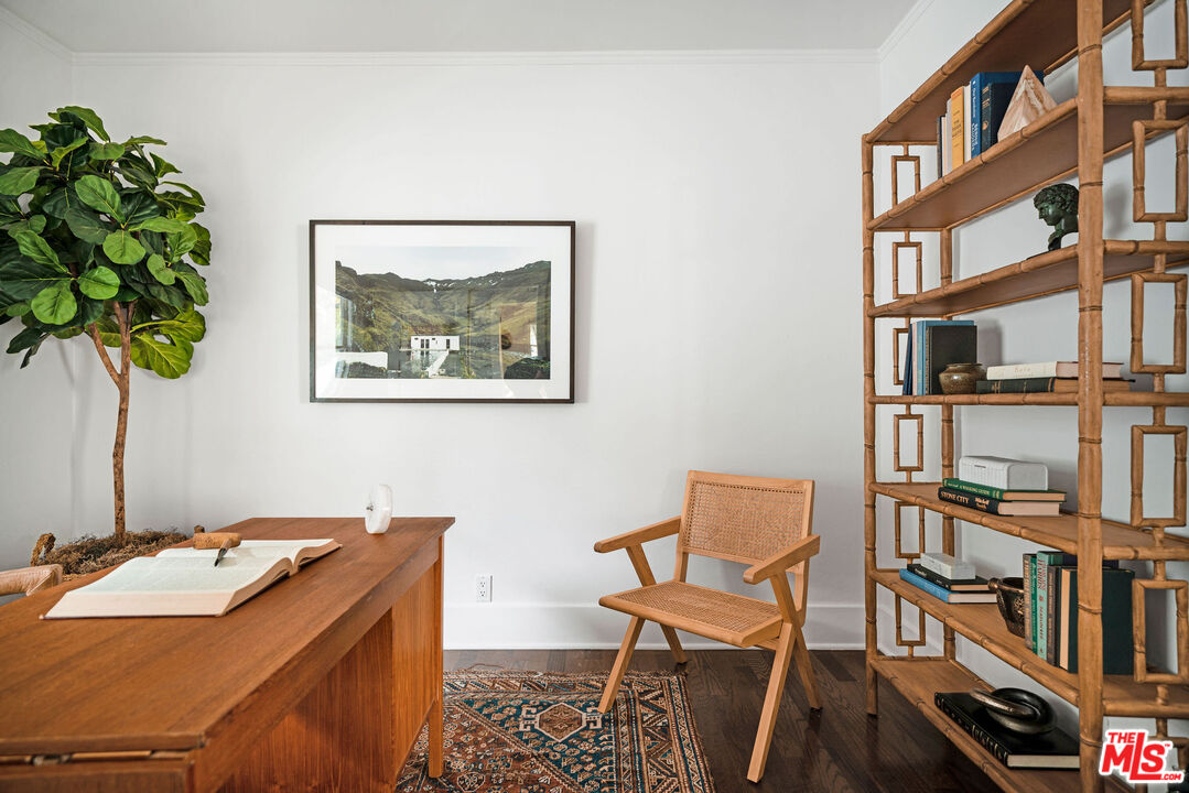 1205 Sanborn Avenue Los Angeles, CA 90029 - Photo 18 of 48 a room with a bookshelf and a desk