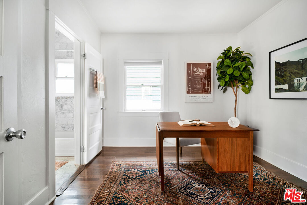 1205 Sanborn Avenue Los Angeles, CA 90029 - Photo 20 of 48 a view of a workspace with furniture and a window