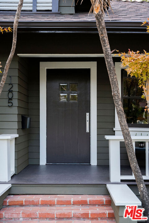 1205 Sanborn Avenue Los Angeles, CA 90029 - Photo 2 of 48 a stove top oven sitting inside of a kitchen