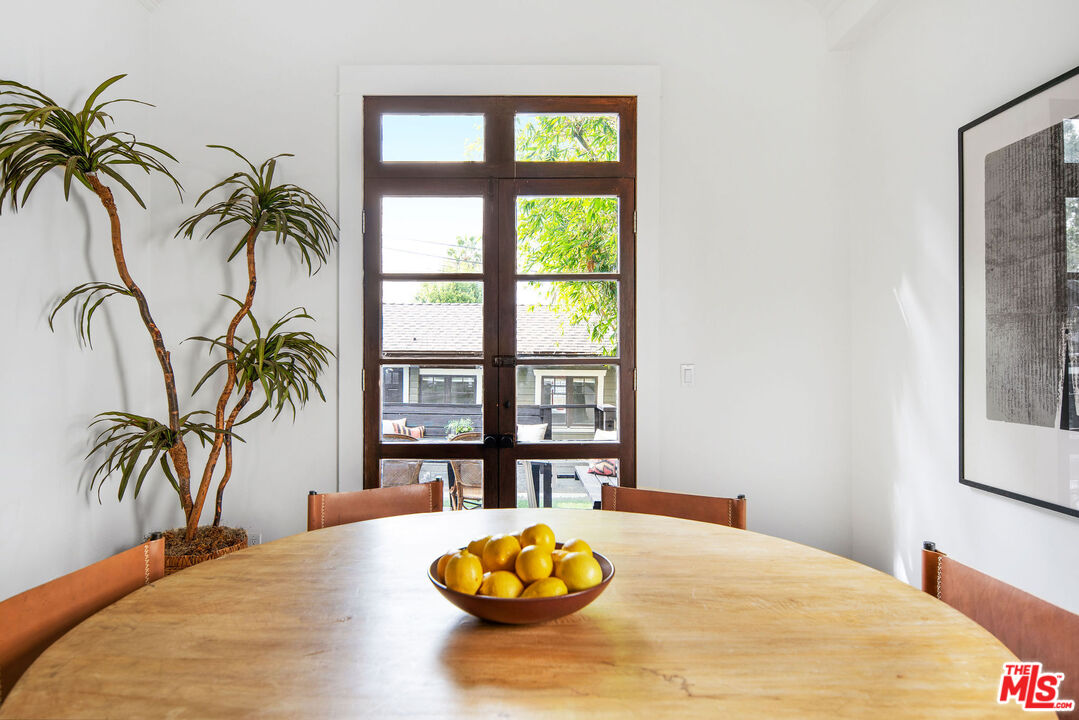 1205 Sanborn Avenue Los Angeles, CA 90029 - Photo 23 of 48 a bedroom with a bed and a large window