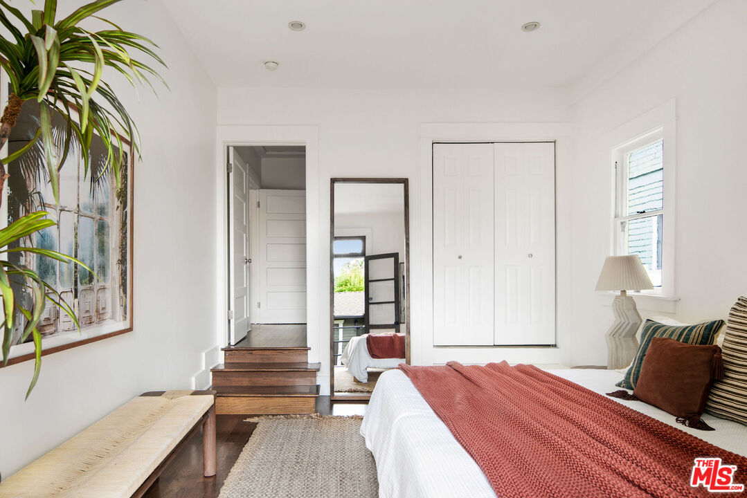 1205 Sanborn Avenue Los Angeles, CA 90029 - Photo 25 of 48 a bedroom with furniture and a potted plant