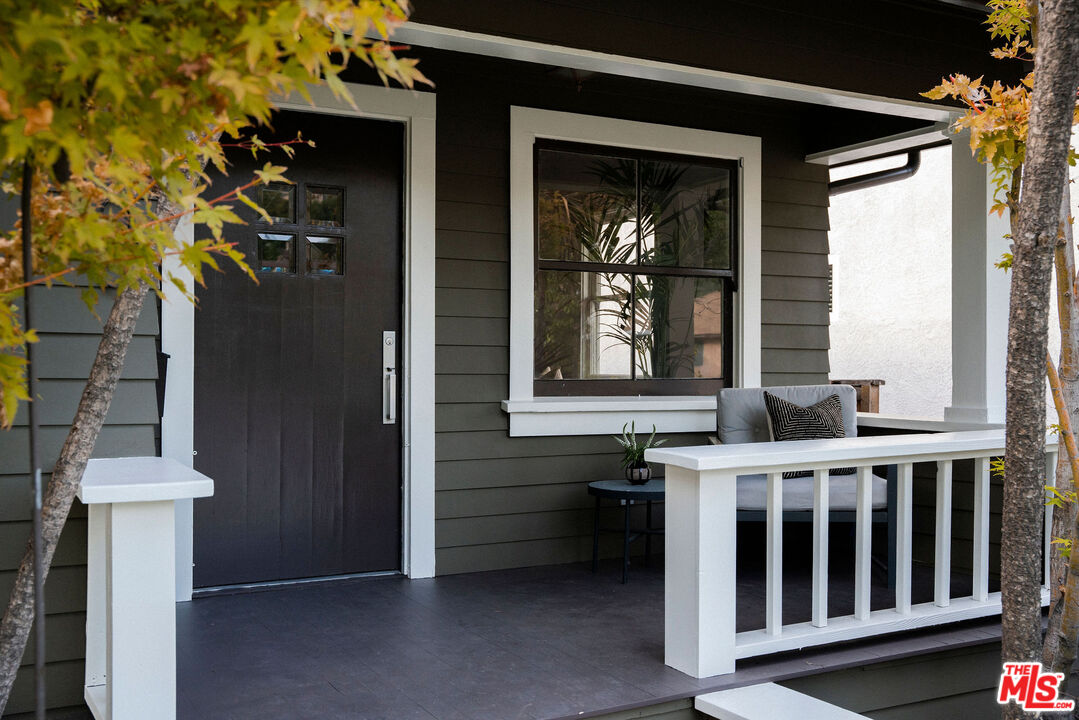 1205 Sanborn Avenue Los Angeles, CA 90029 - Photo 3 of 48 a front view of a house with a porch