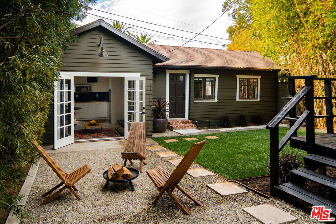 1205 Sanborn Avenue Los Angeles, CA 90029 - Photo 33 of 48 a view of a house with backyard porch and sitting area