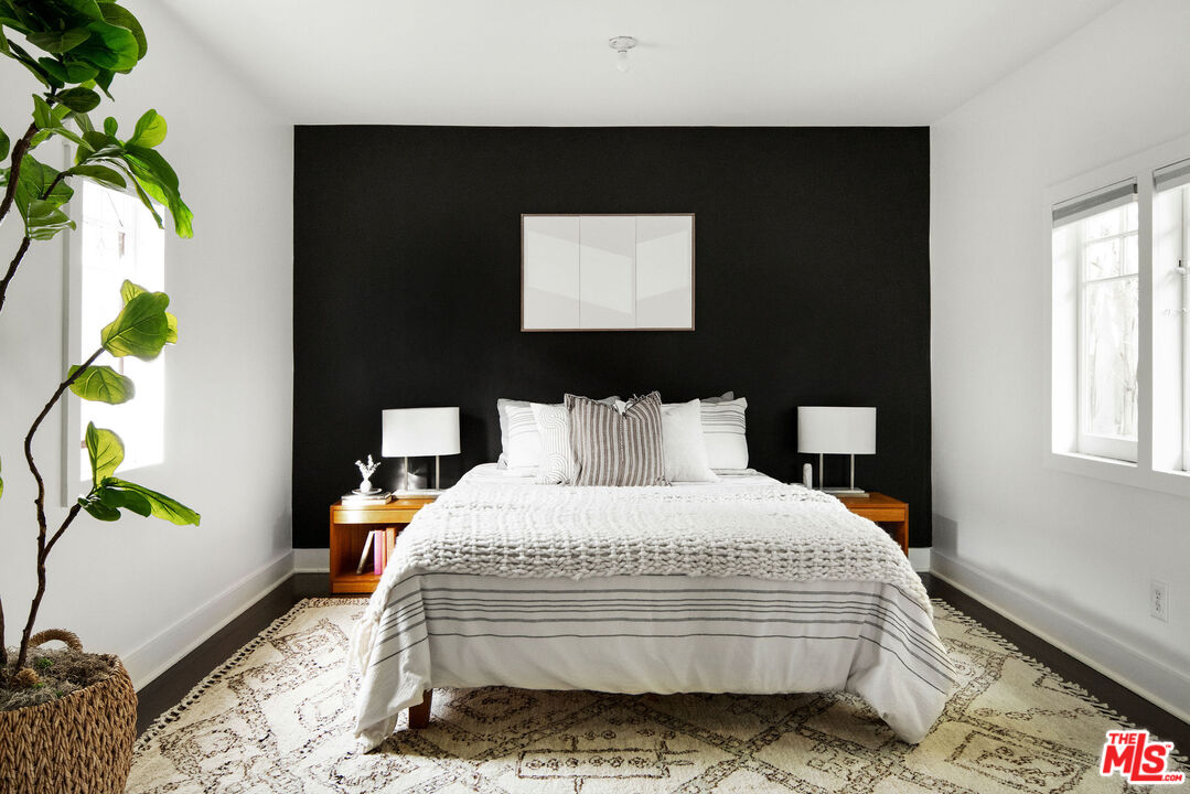 1205 Sanborn Avenue Los Angeles, CA 90029 - Photo 40 of 48 a bedroom with a bed and a potted plant