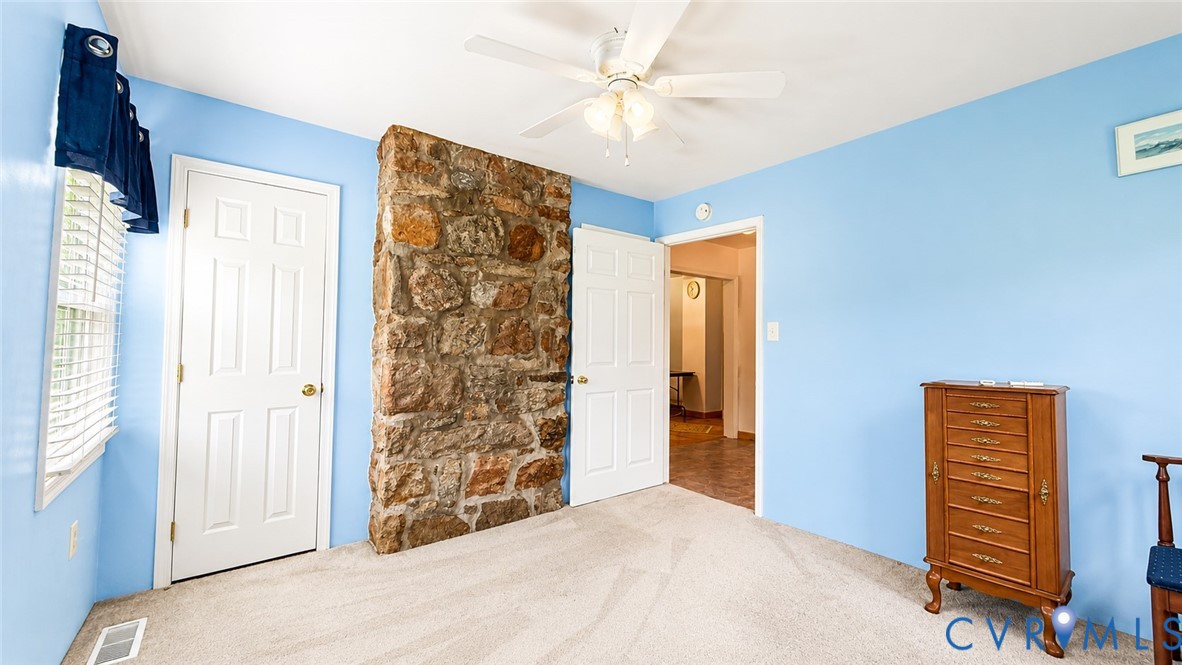 5560 West Hoover Road Reva, VA 22735 - Photo 31 of 32 Interior room featuring a prominent natural stone