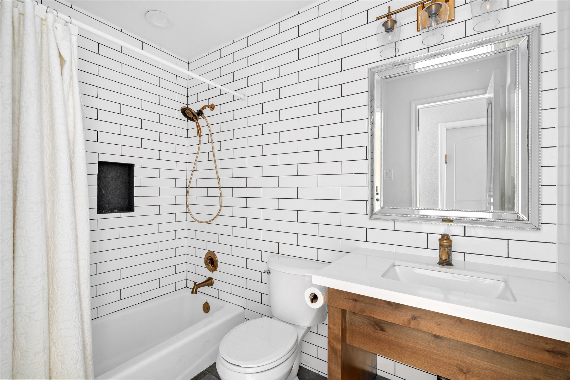 5614 Edith Street Houston, TX 77081 - Photo 12 of 19 Beautifully updated secondary bathroom.