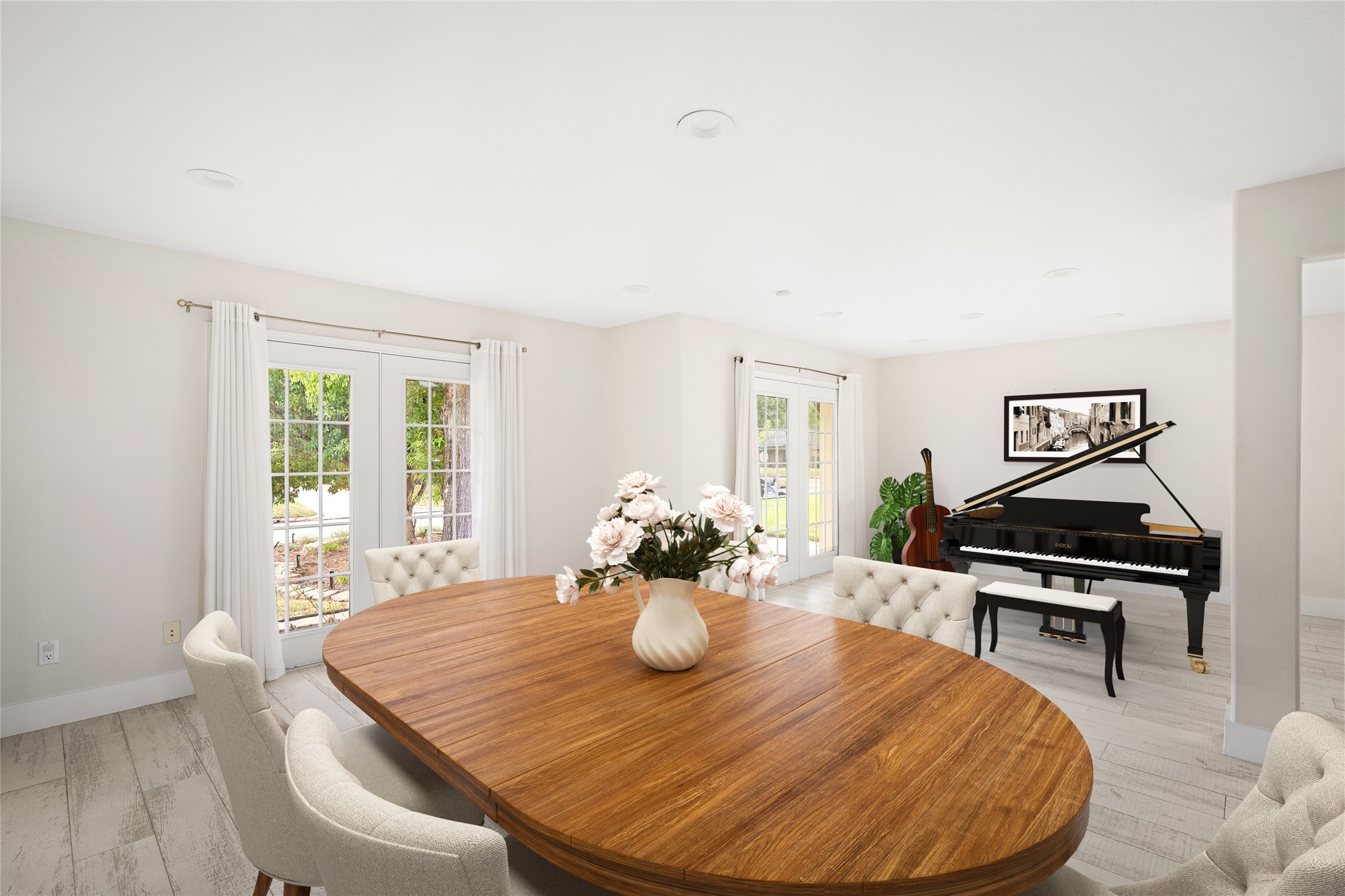 5614 Edith Street Houston, TX 77081 - Photo 6 of 19 Large windows provide plenty of natural light in dining/living area. *Virtual staging has been added*