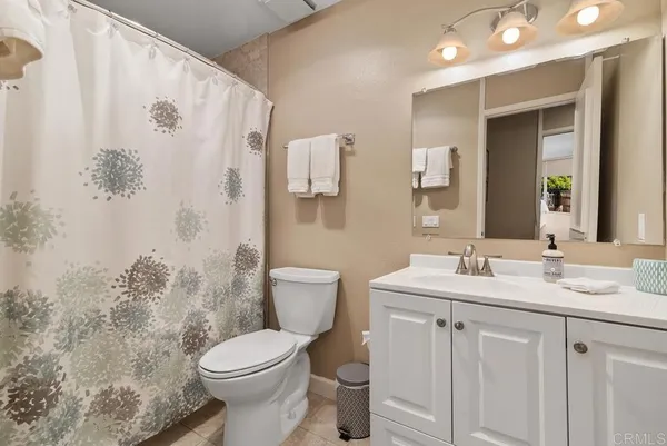 a view of a swimming pool with a table and chairs
