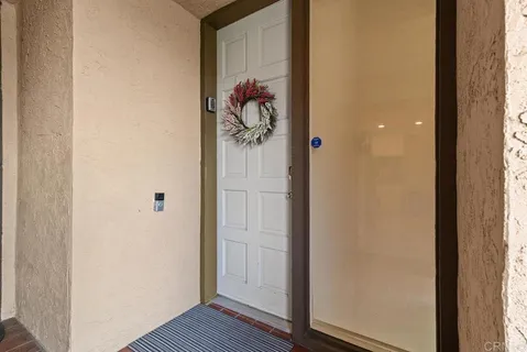 a view of a bathroom with a sink and mirror
