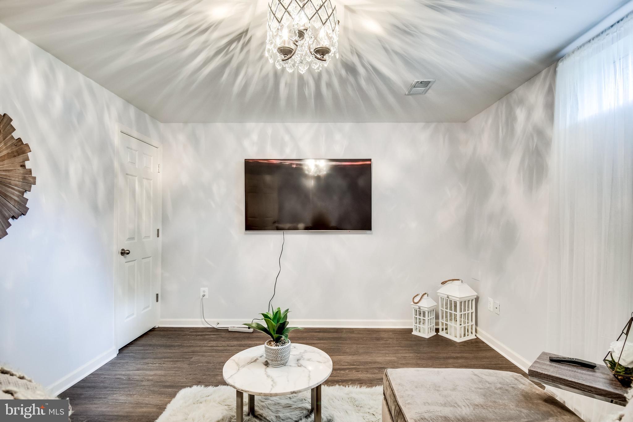 43327 Ritter Lane Chantilly, VA 20152 - Photo 42 of 65 Enjoy family movie night in this cozy setting