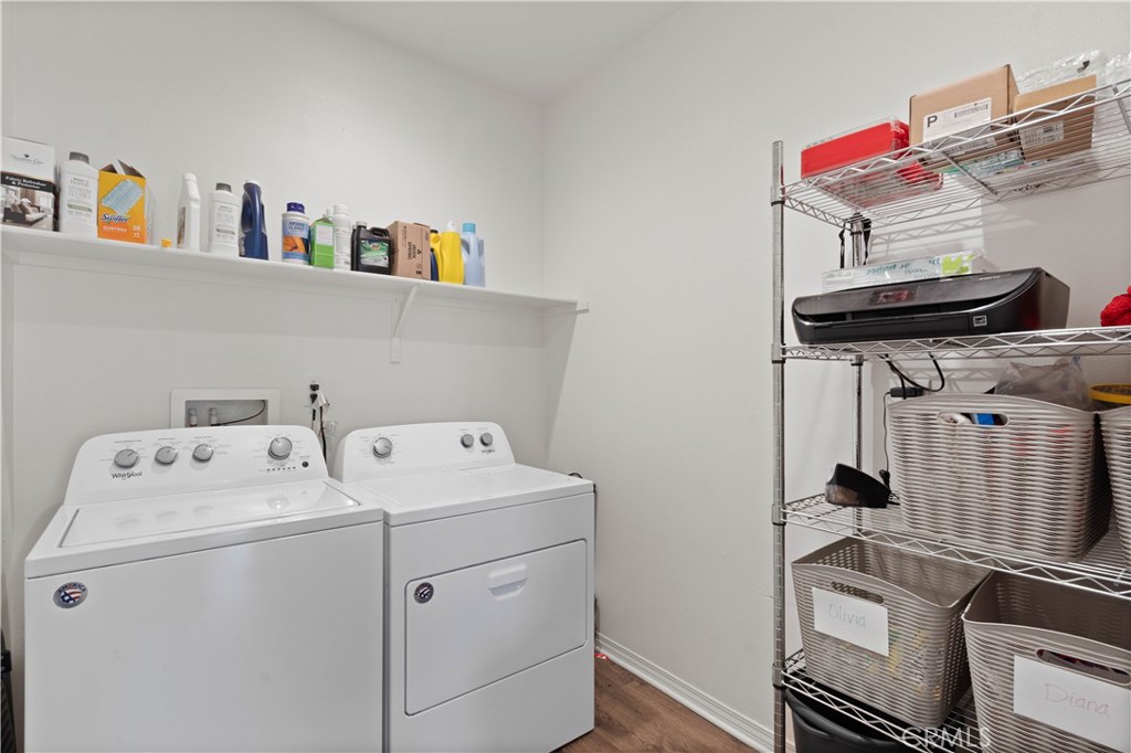 12875 Wainwright Lane Moreno Valley, CA 92555 - Photo 13 of 37 a utility room with dryer and washer