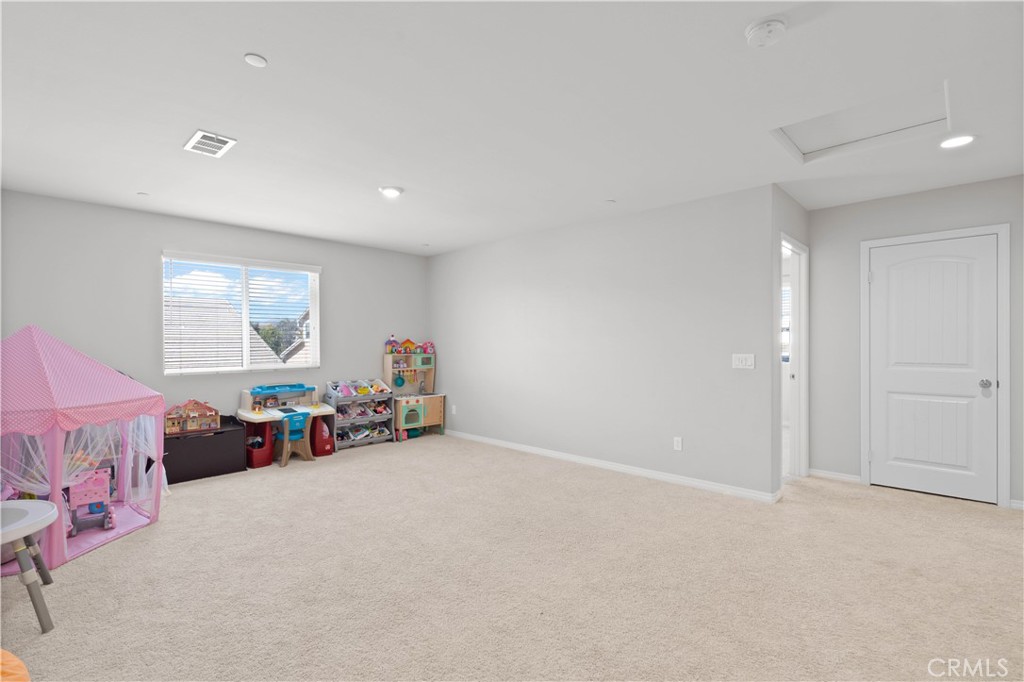12875 Wainwright Lane Moreno Valley, CA 92555 - Photo 16 of 37 a view of a livingroom with furniture and a window