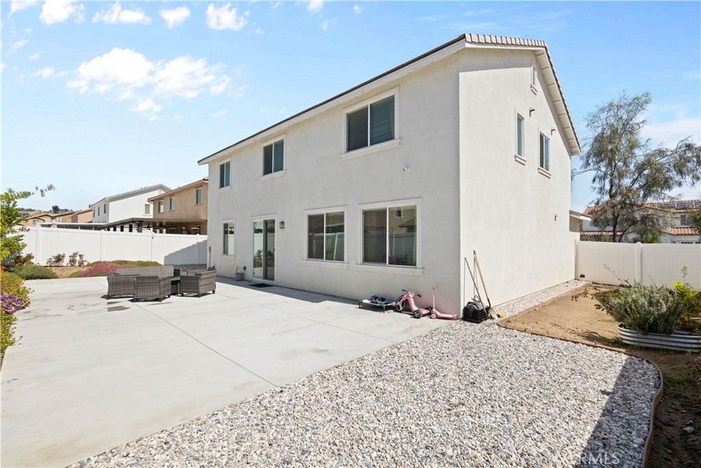 12875 Wainwright Lane Moreno Valley, CA 92555 - Photo 31 of 37 a view of a terrace with a house